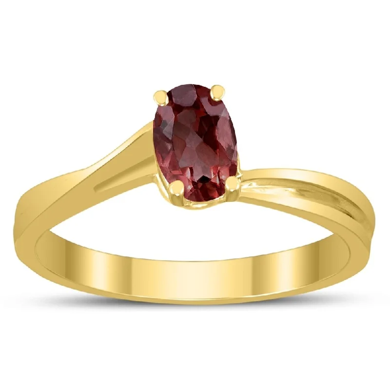 Solitaire Oval 6X4MM Garnet Gemstone Twist Ring in 10K Yellow Gold