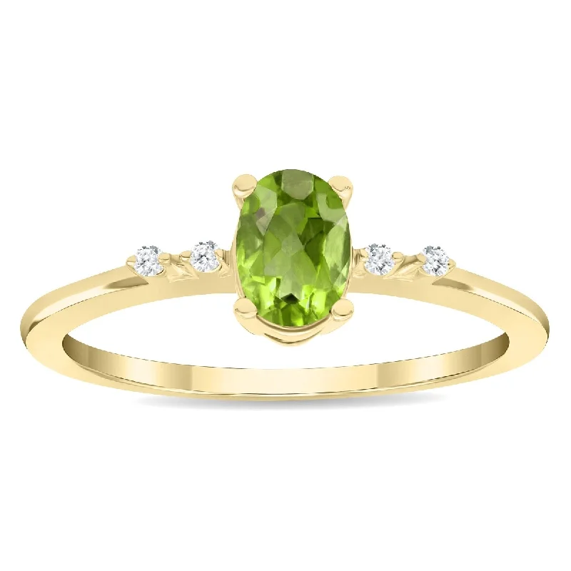 Women's Oval Shaped Peridot and Diamond Sparkle Ring in 10K Yellow Gold