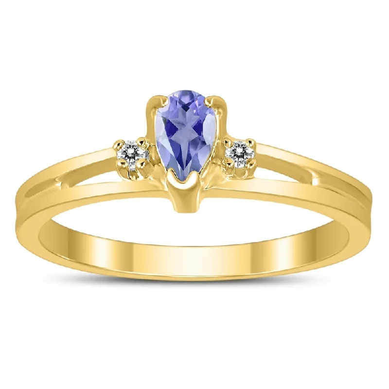 5X3MM Tanzanite and Diamond Pear Shaped Open Three Stone Ring in 10K Yellow Gold