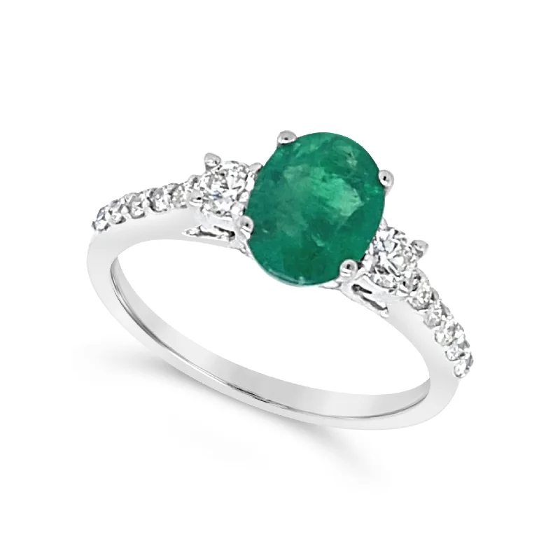 Oval Emerald and Single Diamond Row Ring