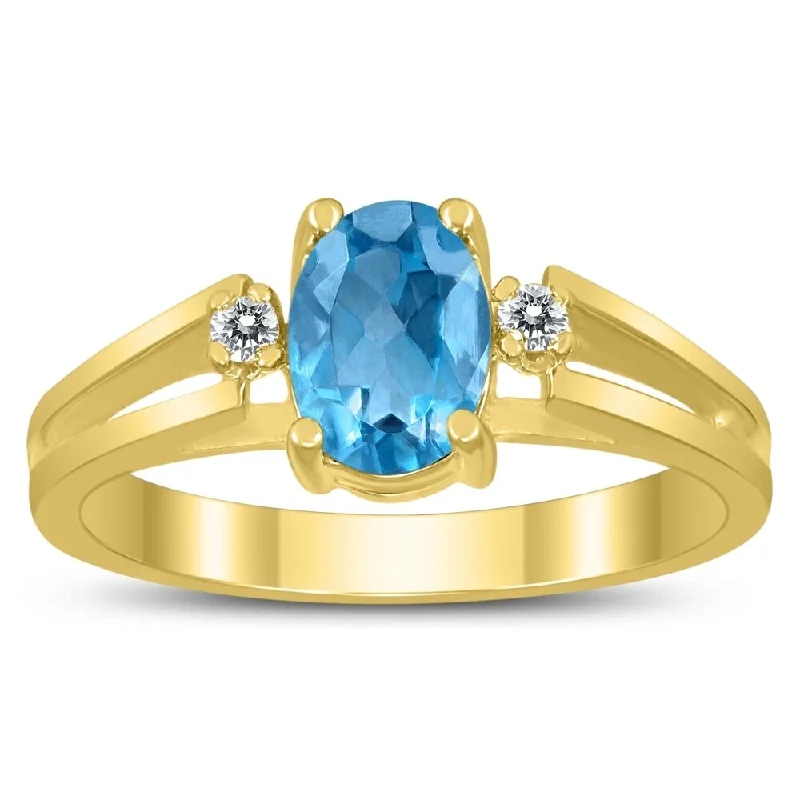 7X5MM Blue Topaz and Diamond Open Three Stone Ring in 10K Yellow Gold