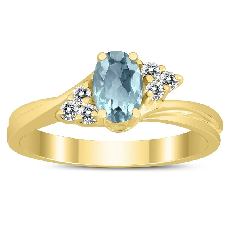 6X4MM Aquamarine and Diamond Twist Ring in 10K Yellow Gold