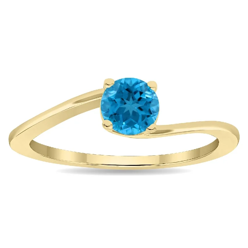 Women's Round Shaped Solitaire Blue Topaz Wave Ring in 10K Yellow Gold