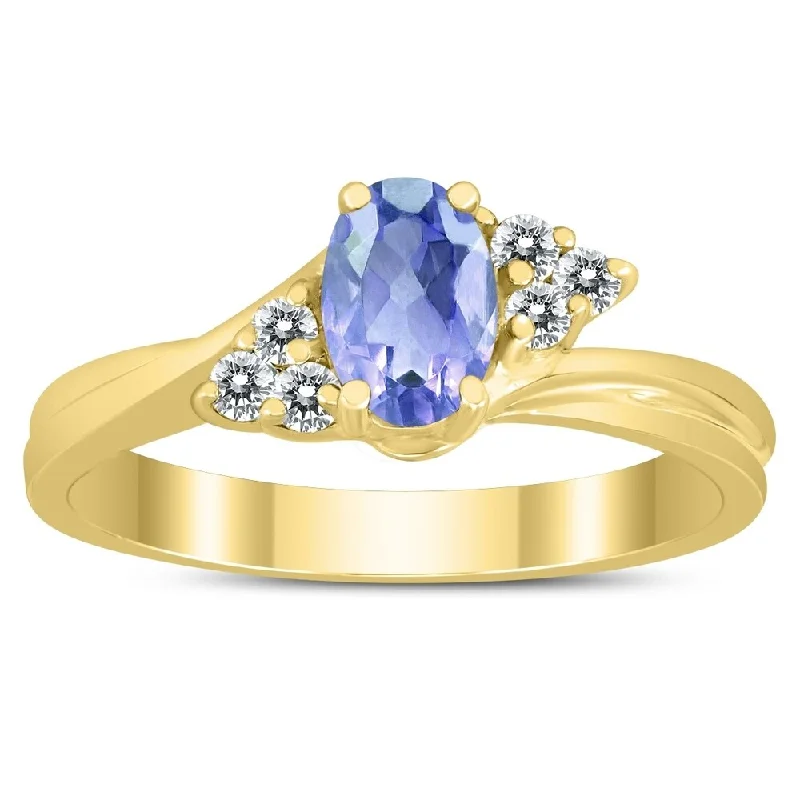 6X4MM Tanzanite and Diamond Twist Ring in 10K Yellow Gold