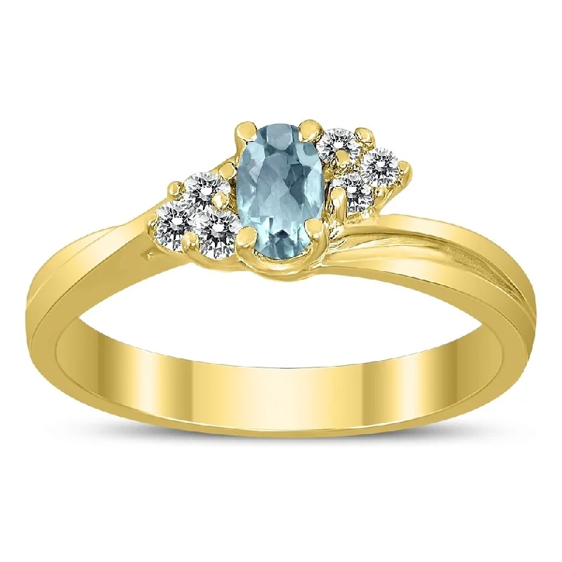 5X3MM Aquamarine and Diamond Twist Ring in 10K Yellow Gold