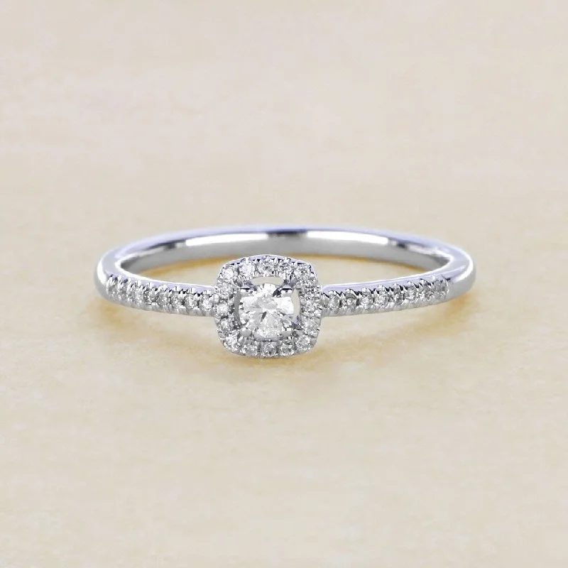 1/5ct TDW Round Shape Diamond Halo Ring in 10k Gold by De Couer