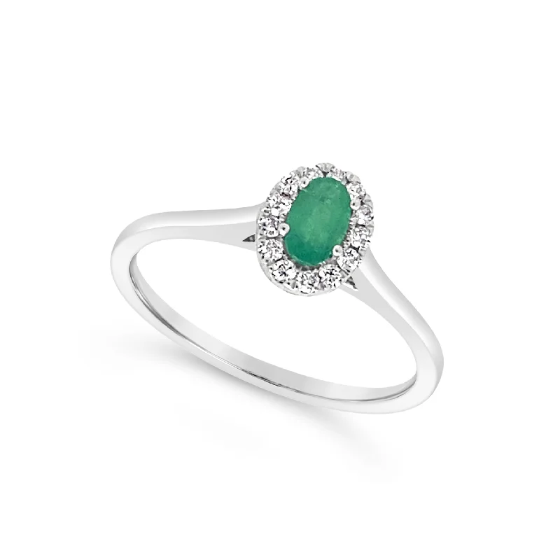 Oval Emerald and Diamond Halo Ring