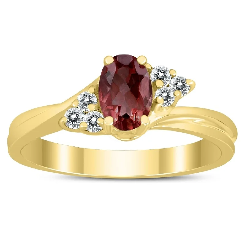 6X4MM Garnet and Diamond Twist Ring in 10K Yellow Gold