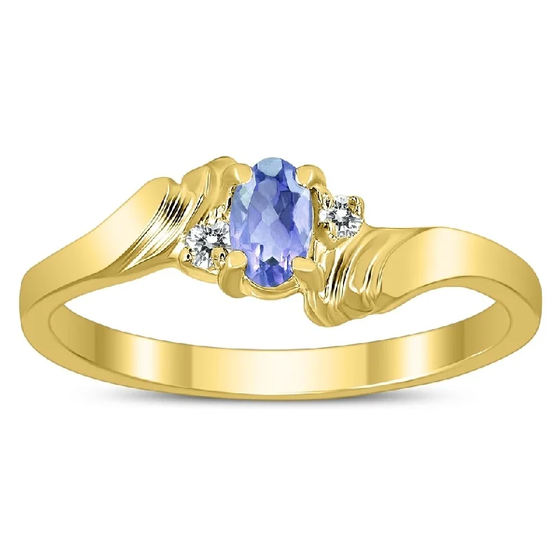 5X3MM Tanzanite and Diamond Wave Ring in 10K Yellow Gold