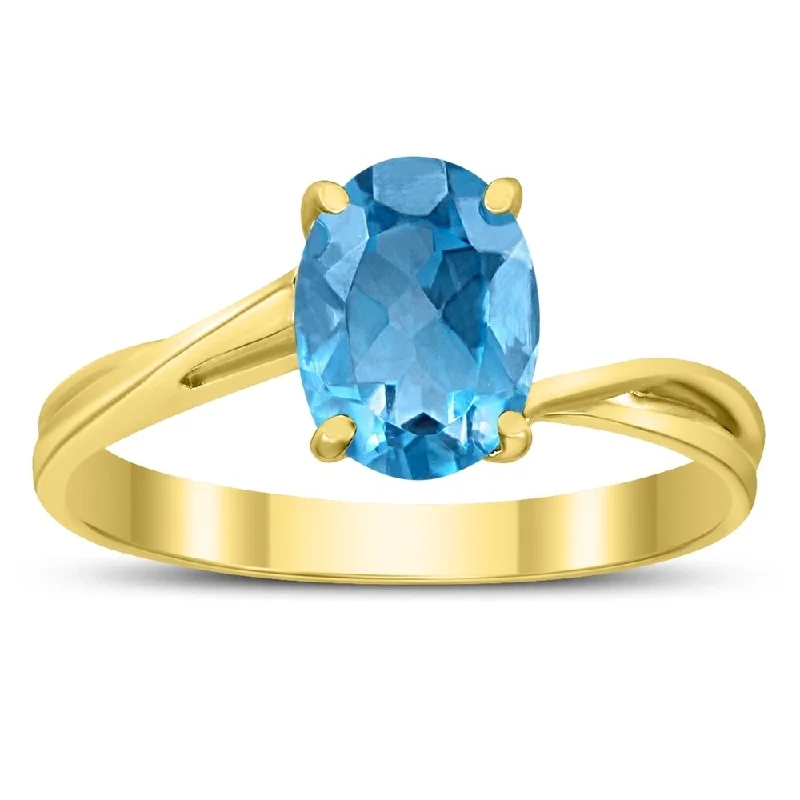 Solitaire Oval 8X6MM Blue Topaz Gemstone Twist Ring in 10K Yellow Gold