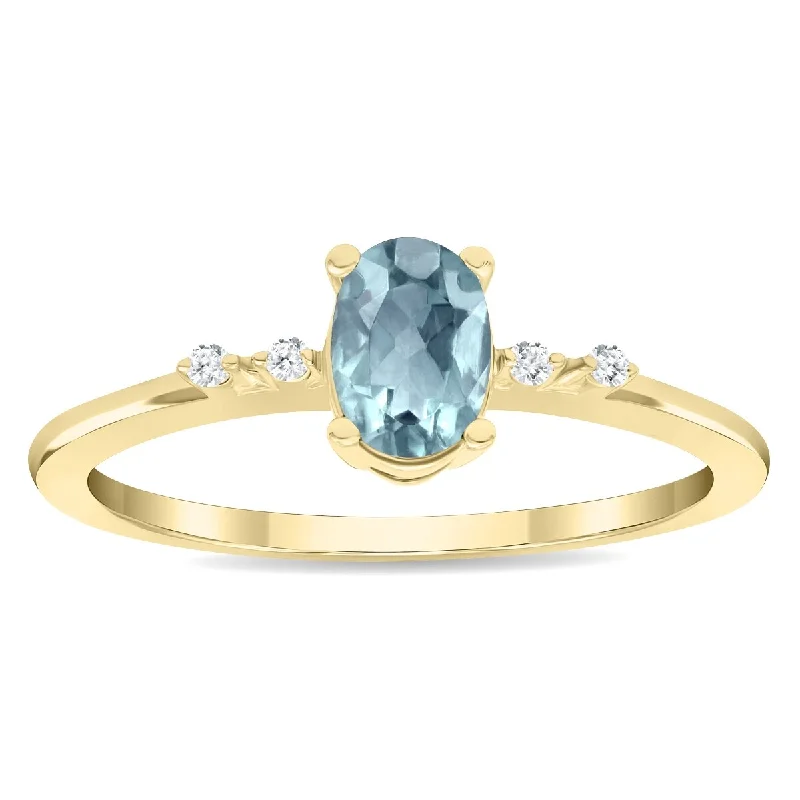 Women's Oval Shaped Aquamarine and Diamond Sparkle Ring in 10K Yellow Gold