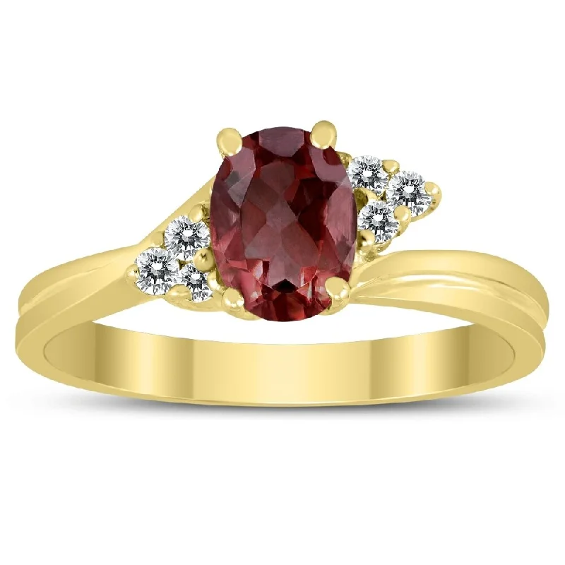 7X5MM Garnet and Diamond Twist Ring in 10K Yellow Gold