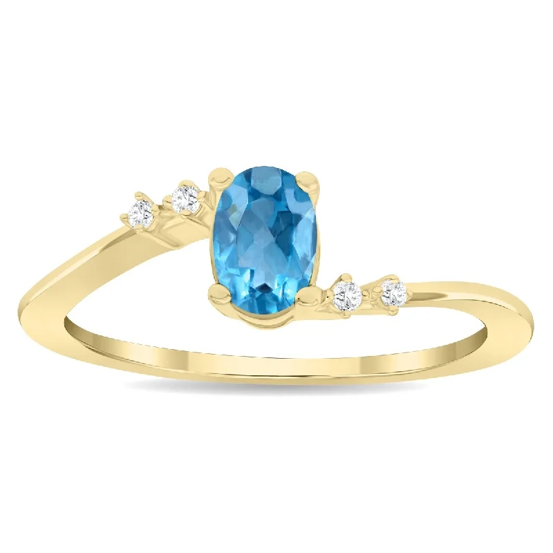 Women's Oval Shaped Blue Topaz and Diamond Tierra Ring in 10K Yellow Gold